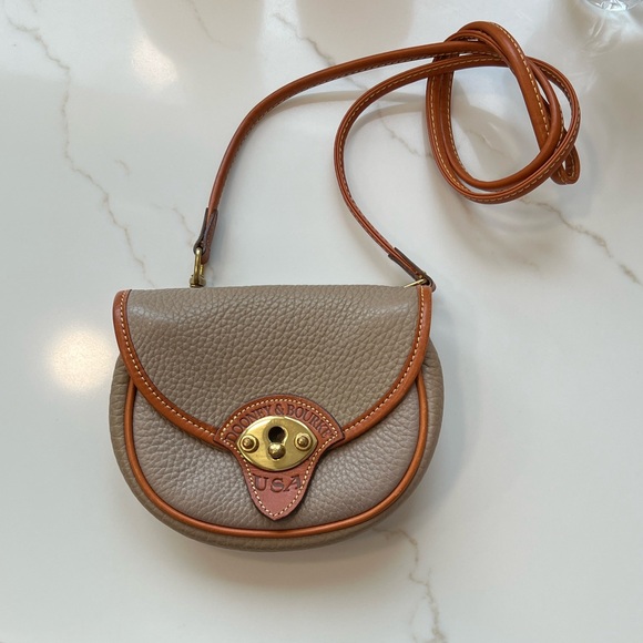 Dooney & Bourke Handbags - Dooney & Bourke Tan Leather Crossbody Calvary bag Brass Hardware Vintage